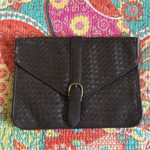 Sleek chocolate brown flat clutch